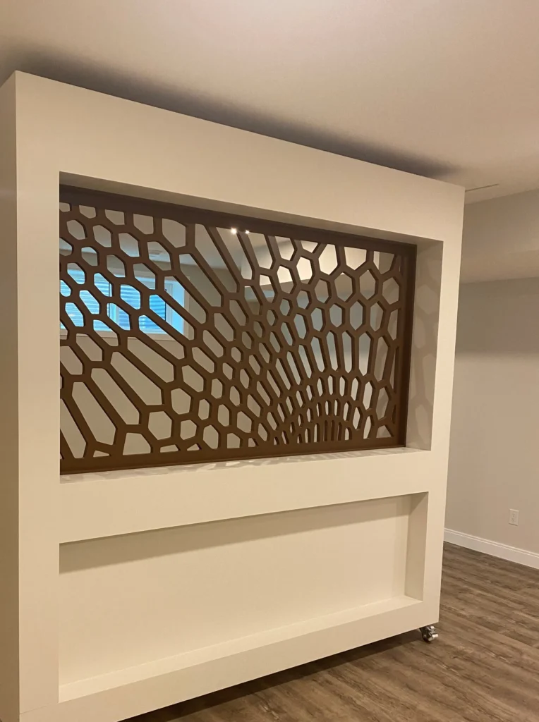 Walnut CNC-carved decorative screen set into a partition wall, made by Prestige